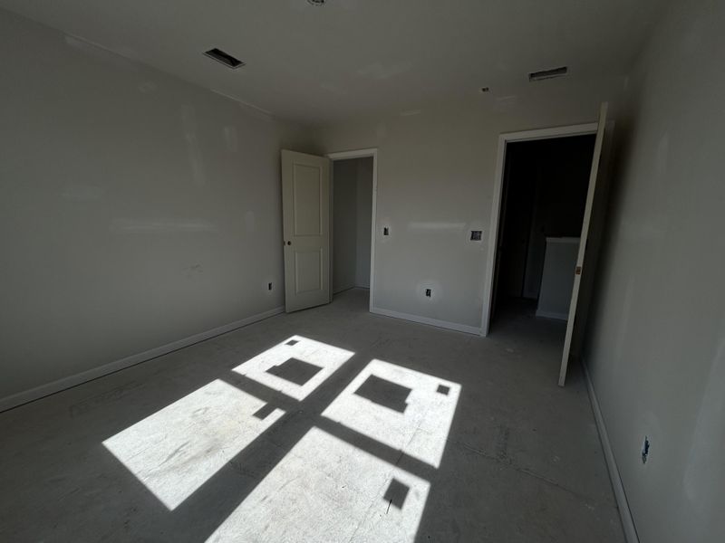 In-progress construction of a new home in Tea Farm: Lake Series, Ravenel, SC (Image 25).