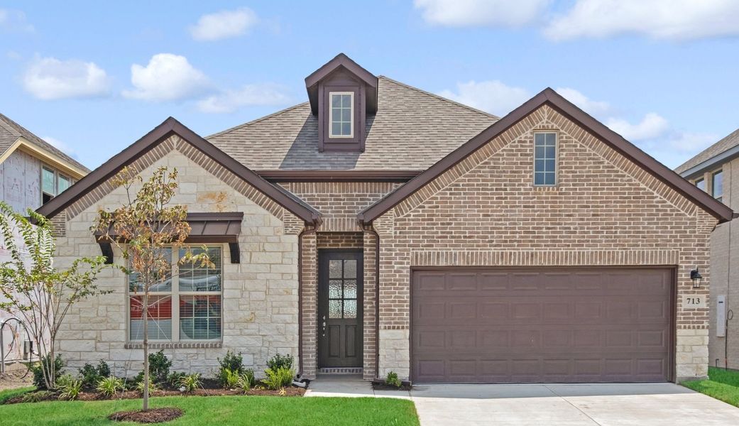 Representative exterior photo of a completed home built from the Colorado Executive by UnionMain Homes in Brookville Estates, Forney, TX (Image 1).