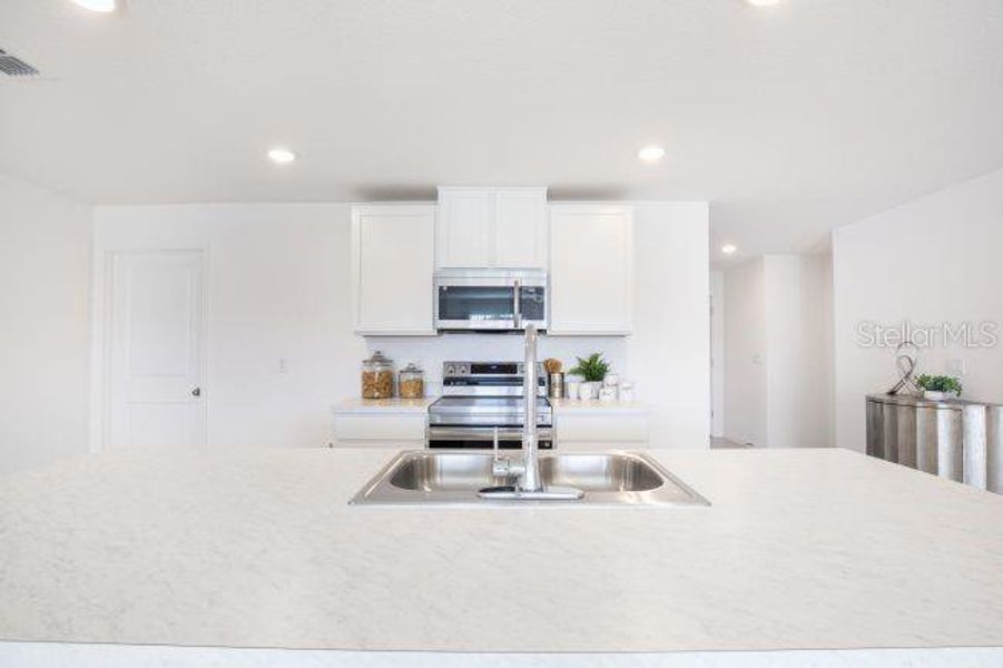 Furnished interior view inside a new home in Royal Highlands, Weeki Wachee (Image 5).