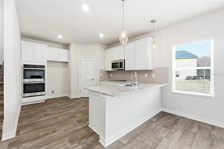 Furnished interior view inside a new home in Fern Dale, Fairburn (Image 8).
