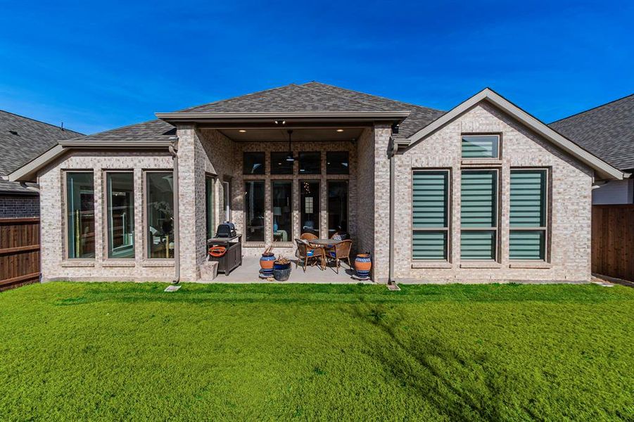 Exterior details and patio area of a home in Sweetgrass, Haslet (Image 4). Exterior details and patio area of a home in Sweetgrass, Haslet (Image 4).