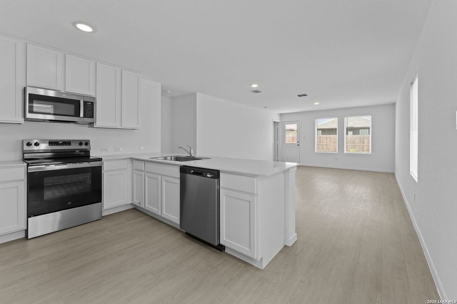 Furnished interior view inside a new home in Higdon Crossing, San Antonio (Image 5).