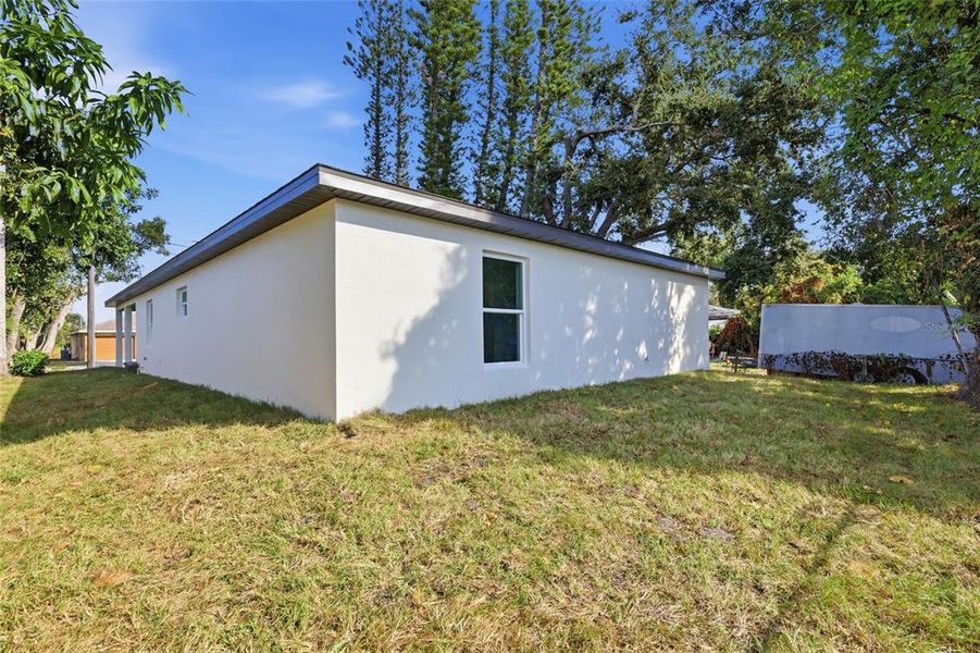 Exterior details and patio area of a home in , Palmetto (Image 13).