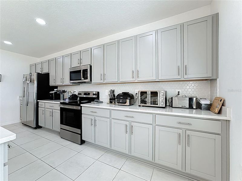 Furnished interior view inside a new home in , Kissimmee (Image 14).