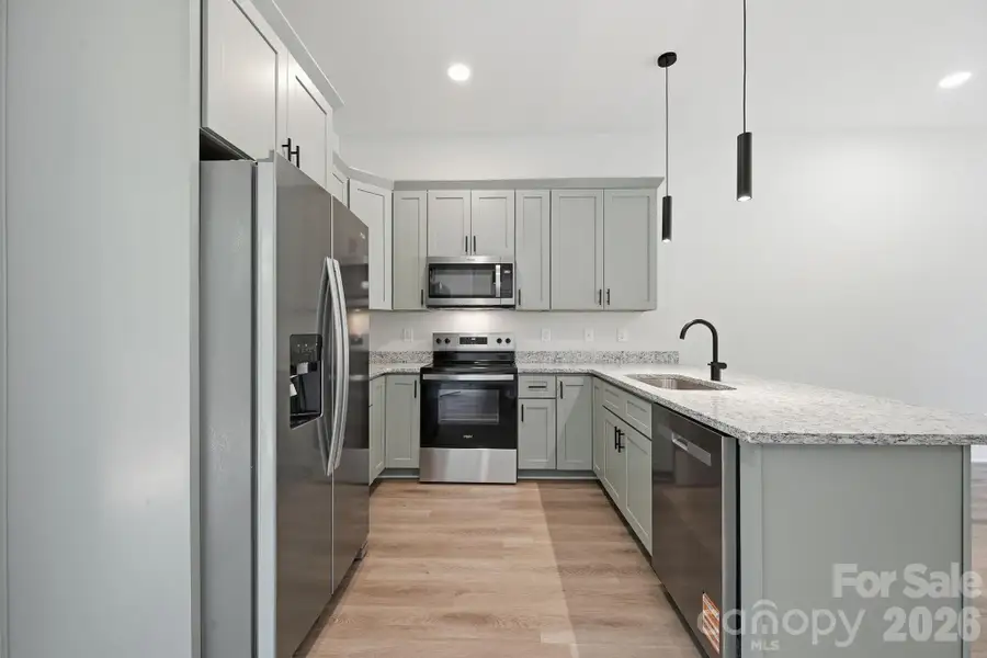 Furnished interior view inside a new home in , Concord (Image 4).