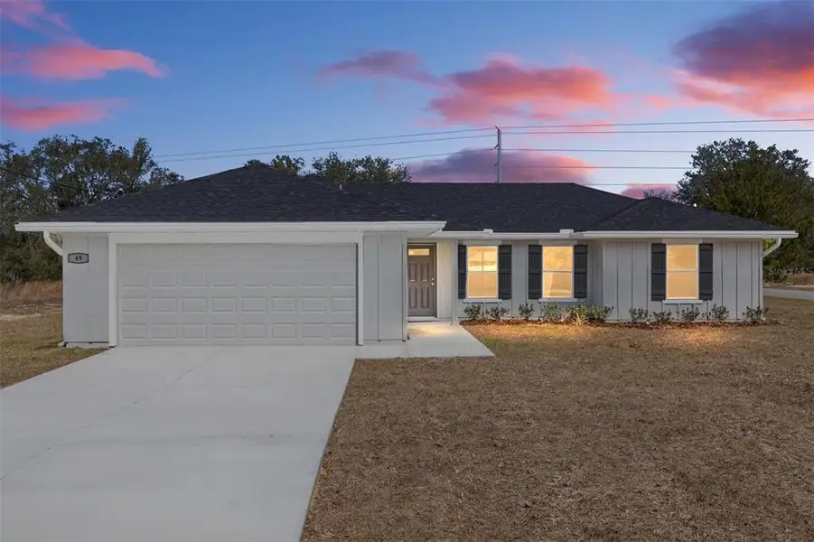 Front exterior of a new home in , Ocala, FL, highlighting curb appeal (Image 19).