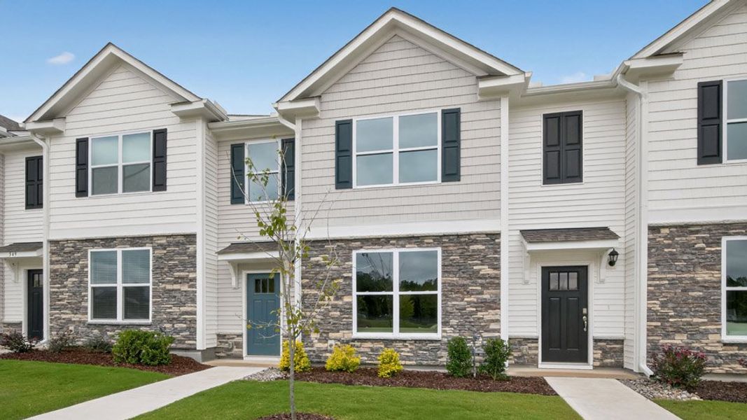 Representative exterior photo of a completed home built from the Blake by D.R. Horton in The Townes at Anderson Farm, Wendell, NC (Image 24).