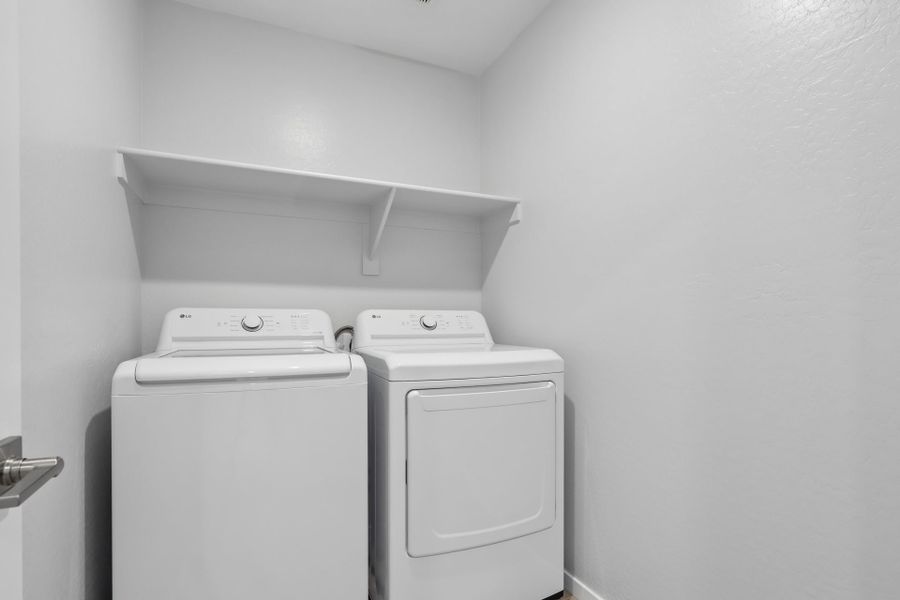 A white washer and dryer.
