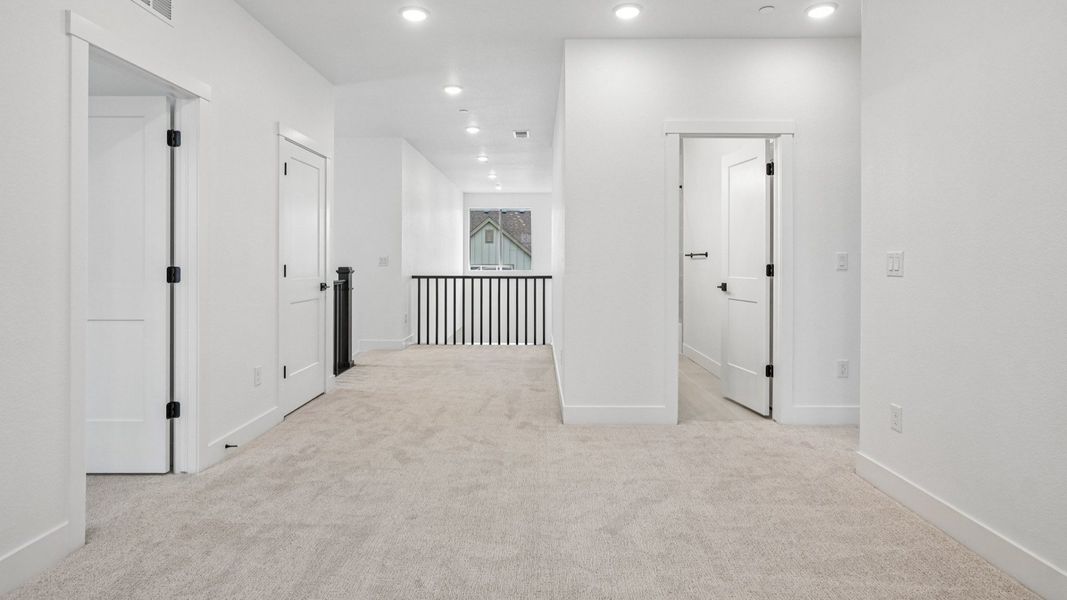Furnished interior view inside a new home in Dillon Pointe - Journey, Broomfield (Image 27).
