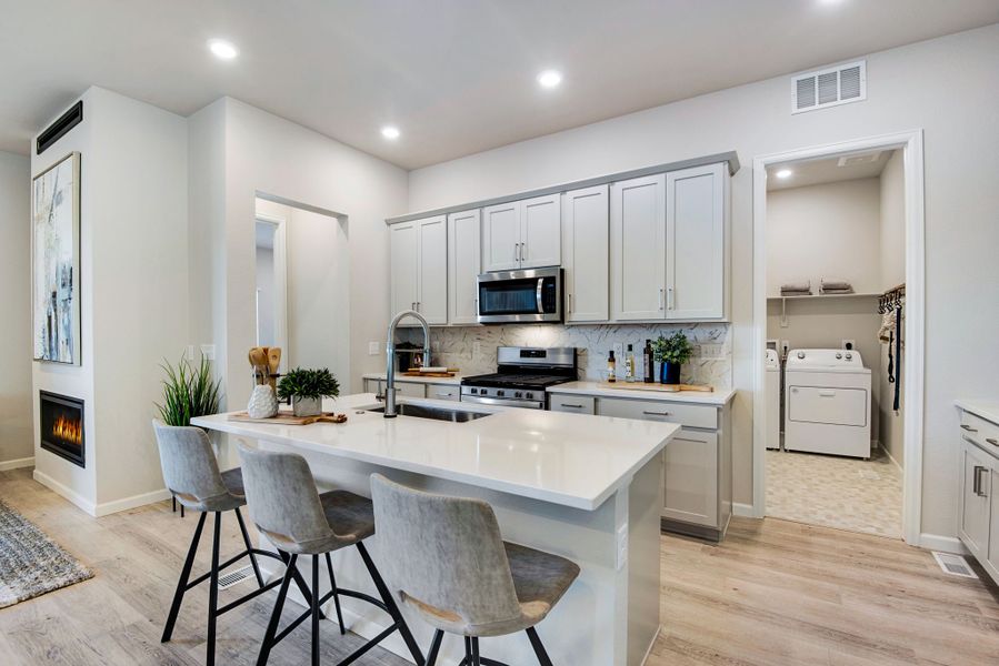 Representative furnished interior of a home built from the 3405 by Tri Pointe Homes in Westside Crossing, Berthoud (Image 10).