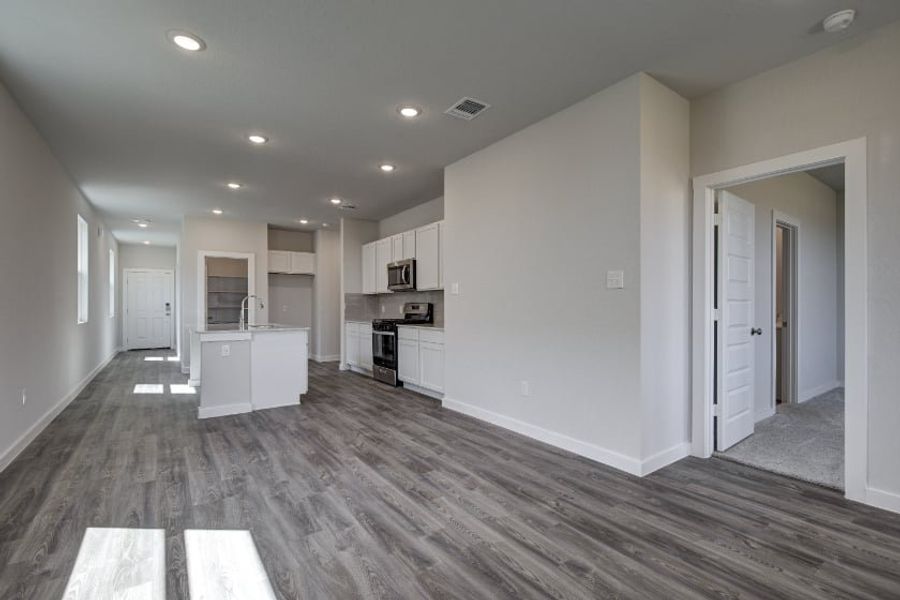 A kitchen with white cabinets. A kitchen with white cabinets.