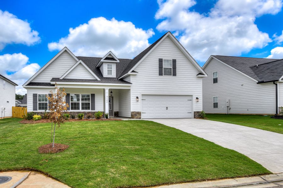 Front exterior of a new home in The Sanctuary, Aiken, SC, highlighting curb appeal (Image 2). Front exterior of a new home in The Sanctuary, Aiken, SC, highlighting curb appeal (Image 2).