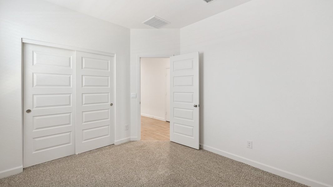 Spacious, unfurnished interior of a new home in Apache Farms, Buckeye (Image 31). Spacious, unfurnished interior of a new home in Apache Farms, Buckeye (Image 31).