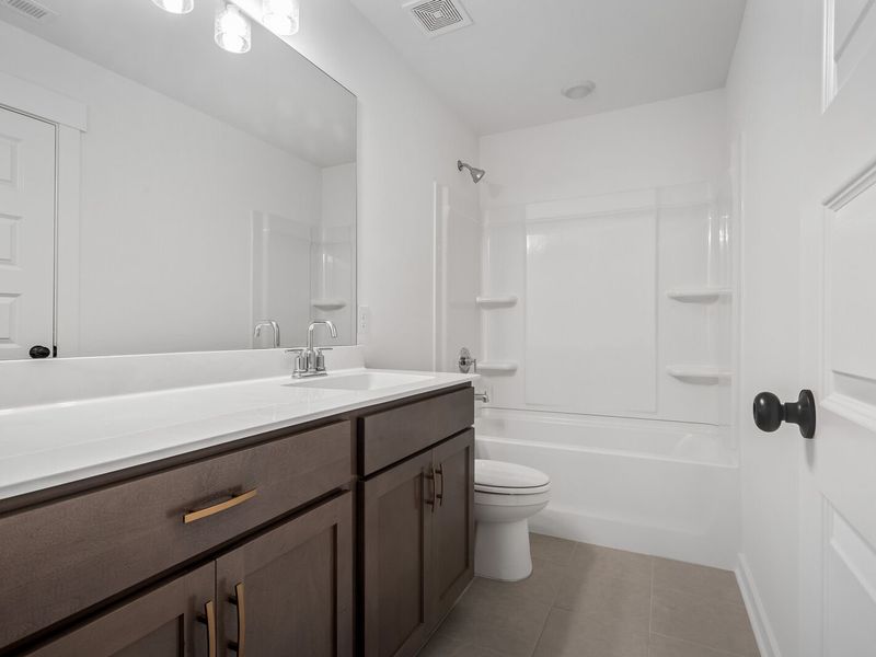 Representative furnished interior of a home built from the The Ridgeport by Davidson Homes LLC in Woods Crossing, Gallatin (Image 14). Representative furnished interior of a home built from the The Ridgeport by Davidson Homes LLC in Woods Crossing, Gallatin (Image 14).