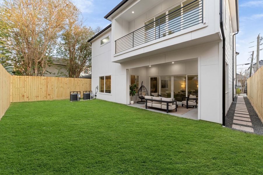 Exterior details and patio area of a home in , Houston (Image 3).