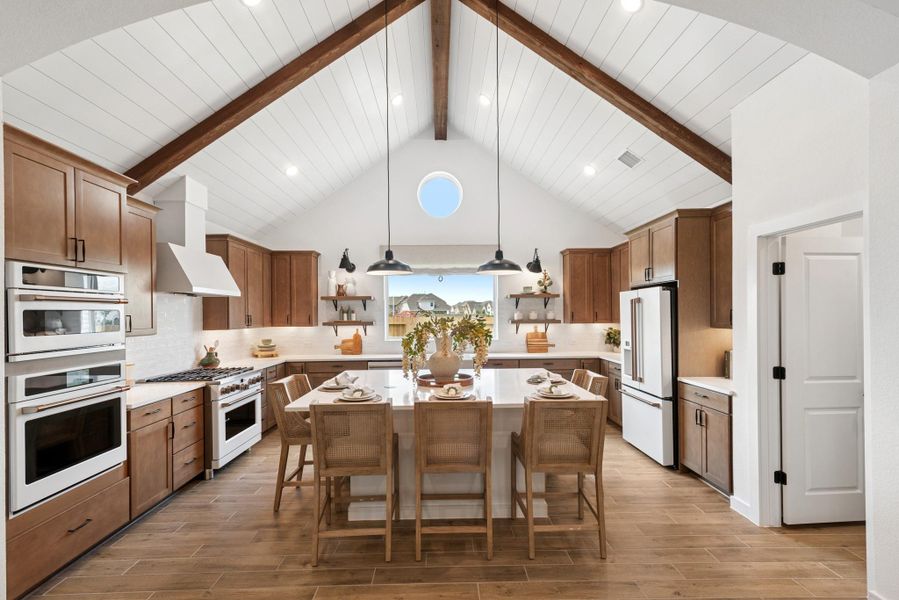 Stunning island kitchen (*Photo not of actual home and used for illustration purposes only.)