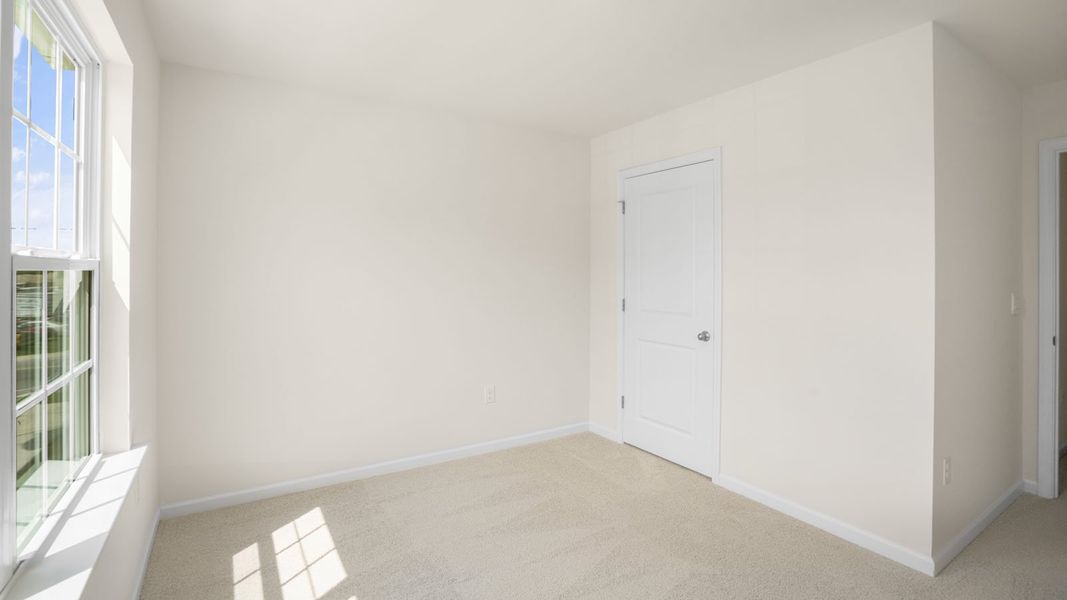 Spacious, unfurnished interior of a new home in Thornton Townes, Raleigh (Image 22).