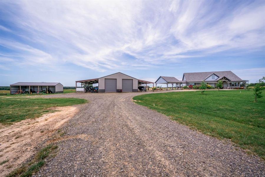 Front exterior of a new home in , Troup, TX, highlighting curb appeal (Image 26). Front exterior of a new home in , Troup, TX, highlighting curb appeal (Image 26).