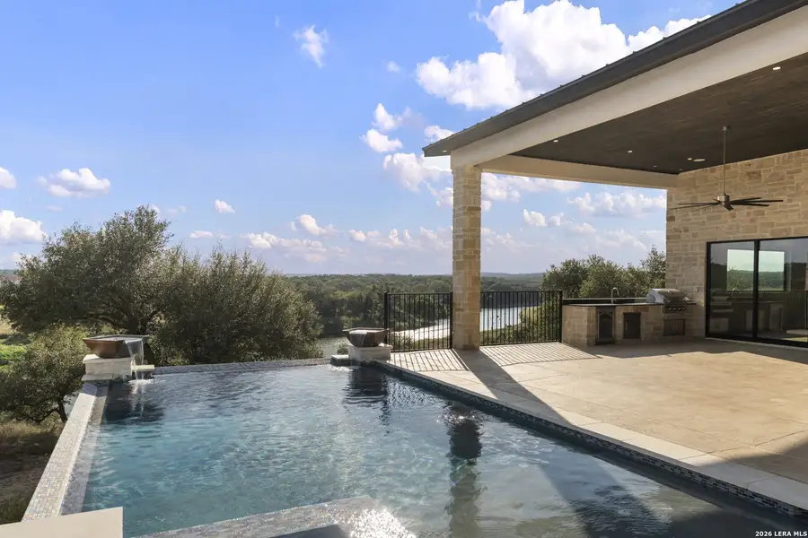 Exterior details and patio area of a home in , Canyon Lake (Image 37).