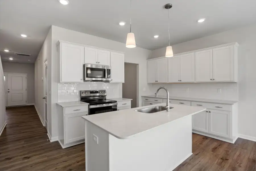 Furnished interior view inside a new home in West Main Townhomes, Sanford (Image 7). Furnished interior view inside a new home in West Main Townhomes, Sanford (Image 7).
