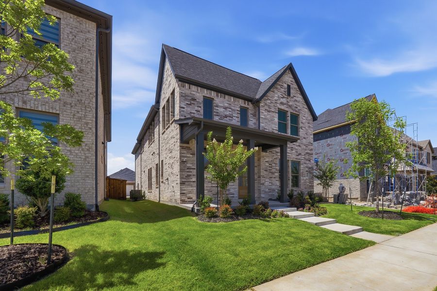 Front exterior of a new home in Light Farms Brenham - 40' Lots, Celina, TX, highlighting curb appeal (Image 26).