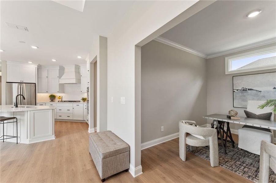 Furnished interior view inside a new home in The Courtyards of Franklin Goldmine, Cumming (Image 3).
