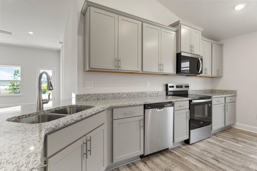 Furnished interior view inside a new home in Shadow Crest at Rolling Hills, Green Cove Springs (Image 6).