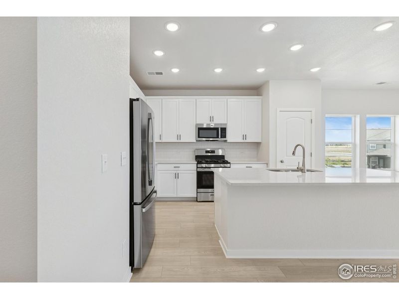 Furnished interior view inside a new home in , Loveland (Image 4).