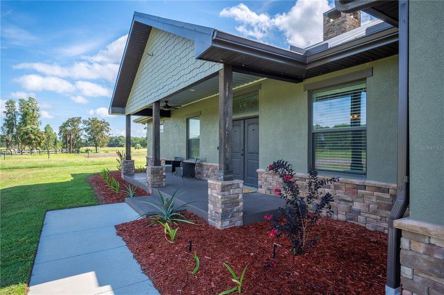 Front exterior of a new home in , Lakeland, FL, highlighting curb appeal (Image 26).