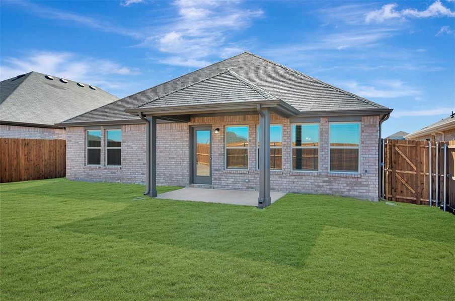Exterior details and patio area of a home in Verandah, Royse City (Image 4).