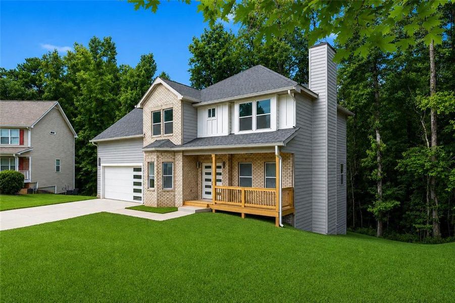 Front exterior of a new home in , Ellenwood, GA, highlighting curb appeal (Image 23).