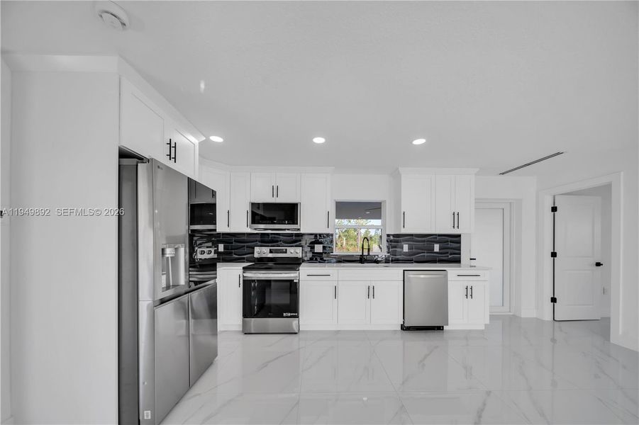 Furnished interior view inside a new home in , Lehigh Acres (Image 6).