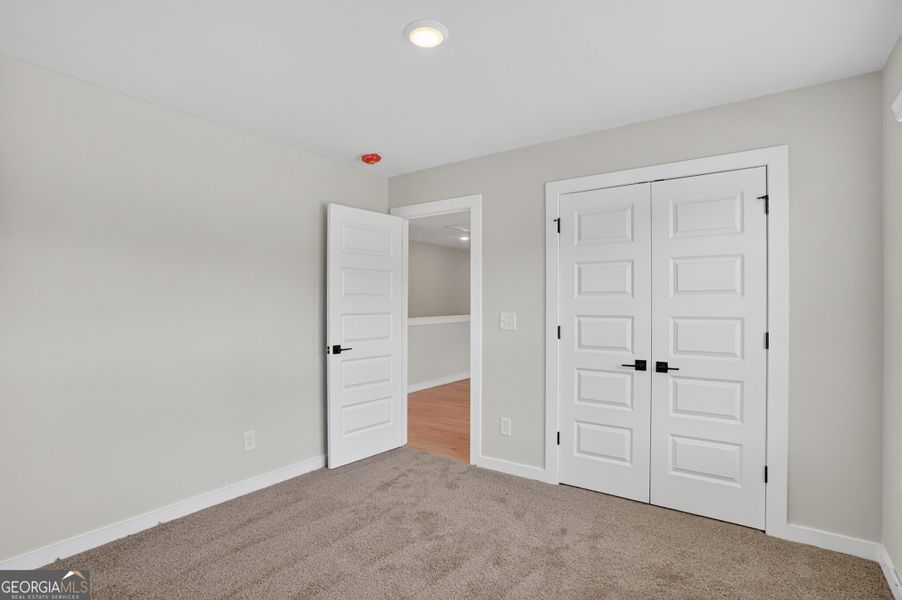Spacious, unfurnished interior of a new home in The Fairways at Mirror Lake, Villa Rica (Image 41). Spacious, unfurnished interior of a new home in The Fairways at Mirror Lake, Villa Rica (Image 41).
