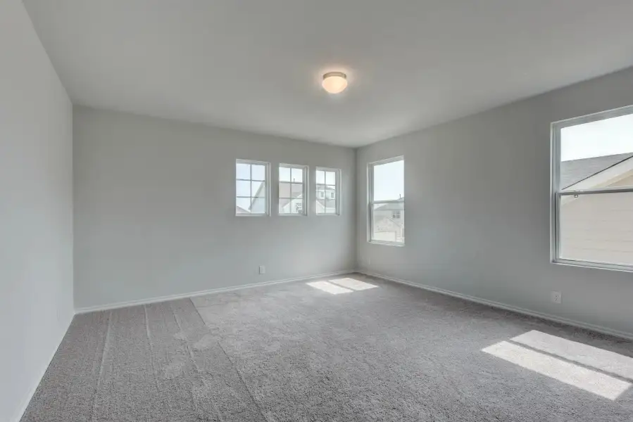 Representative unfurnished interior of a home built from the Colton by Ashton Woods in Saddlebrook Ranch, Schertz (Image 10).