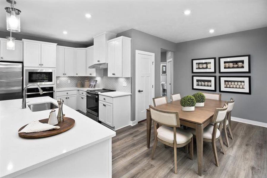 Representative furnished interior of a home built from the Roanoke by Ryan Homes in Muirwood, Murfreesboro (Image 9).