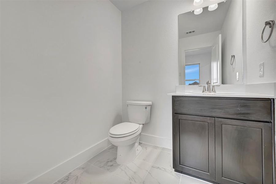 Furnished interior view inside a new home in Lily Creek at Sutton Fields, Aubrey (Image 15).