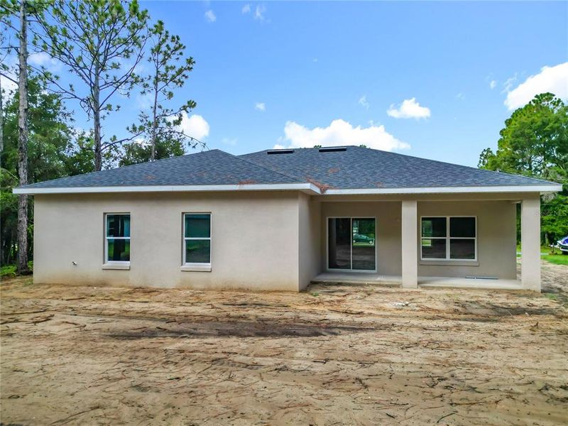 Front exterior of a new home in , Citrus Springs, FL, highlighting curb appeal (Image 1). Front exterior of a new home in , Citrus Springs, FL, highlighting curb appeal (Image 1).