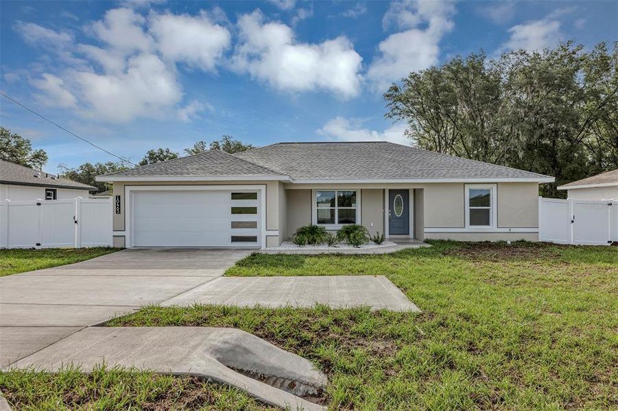 Front exterior of a new home in , Dunnellon, FL, highlighting curb appeal (Image 1). Front exterior of a new home in , Dunnellon, FL, highlighting curb appeal (Image 1).