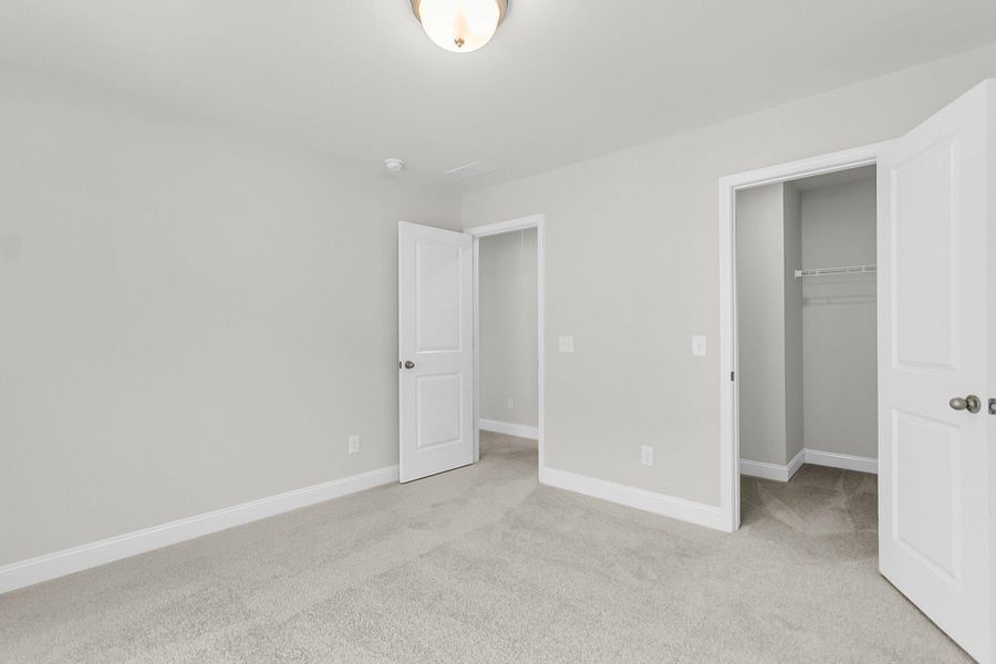 Spacious, unfurnished interior of a new home in Sweetgrass Station, Summerville (Image 21).