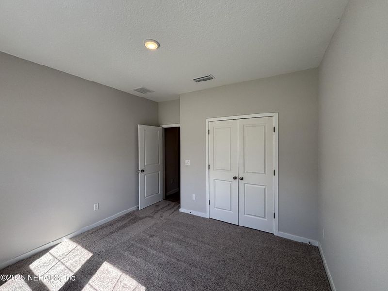 Spacious, unfurnished interior of a new home in The Magnolia Series at Reserve East, Flagler Beach (Image 21).