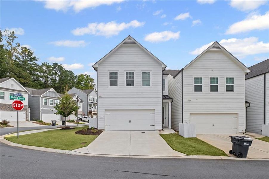 Front exterior of a new home in , Woodstock, GA, highlighting curb appeal (Image 1). Front exterior of a new home in , Woodstock, GA, highlighting curb appeal (Image 1).