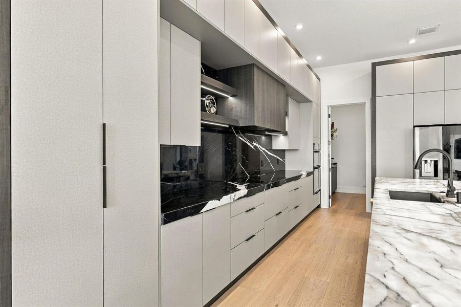 Sleek Kitchen with Built- In Appliances Sleek Kitchen with Built- In Appliances
