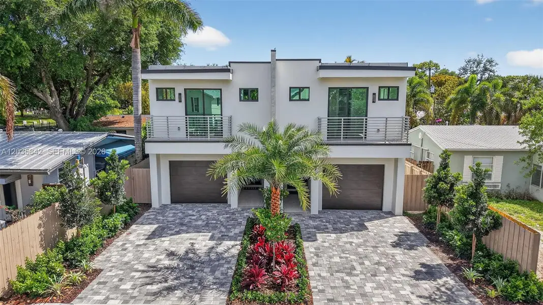 Front exterior of a new home in , Fort Lauderdale, FL, highlighting curb appeal (Image 1). Front exterior of a new home in , Fort Lauderdale, FL, highlighting curb appeal (Image 1).