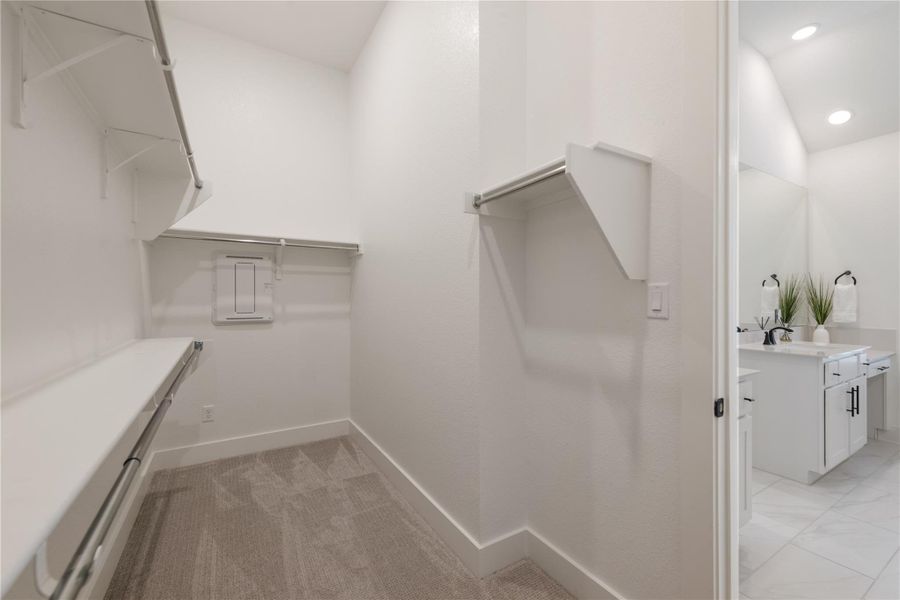 Primary walk-in closet! Primary walk-in closet!