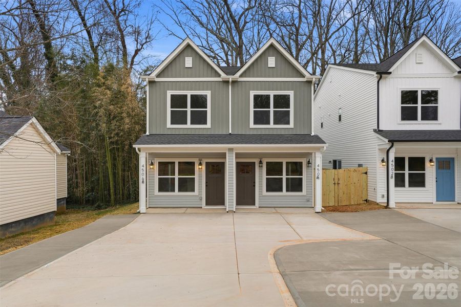 Front exterior of a new home in , Charlotte, NC, highlighting curb appeal (Image 25). Front exterior of a new home in , Charlotte, NC, highlighting curb appeal (Image 25).