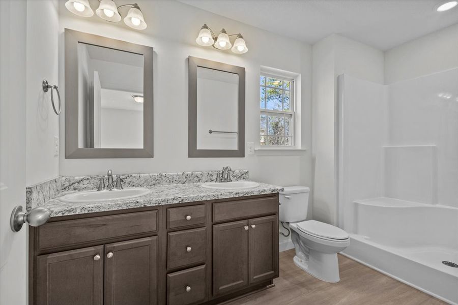 Representative furnished interior of a home built from the Roebuck by Enchanted Homes in Las Palomas Country Club Estates, La Vernia (Image 10).
