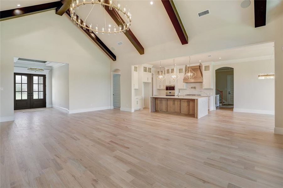 View of Family Room to Kitchen & Front Door