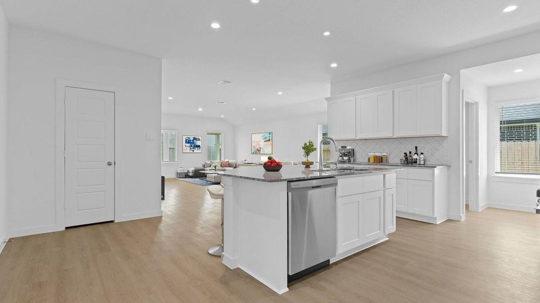 Furnished interior view inside a new home in Caldwell Crossing, Iowa Colony (Image 6).