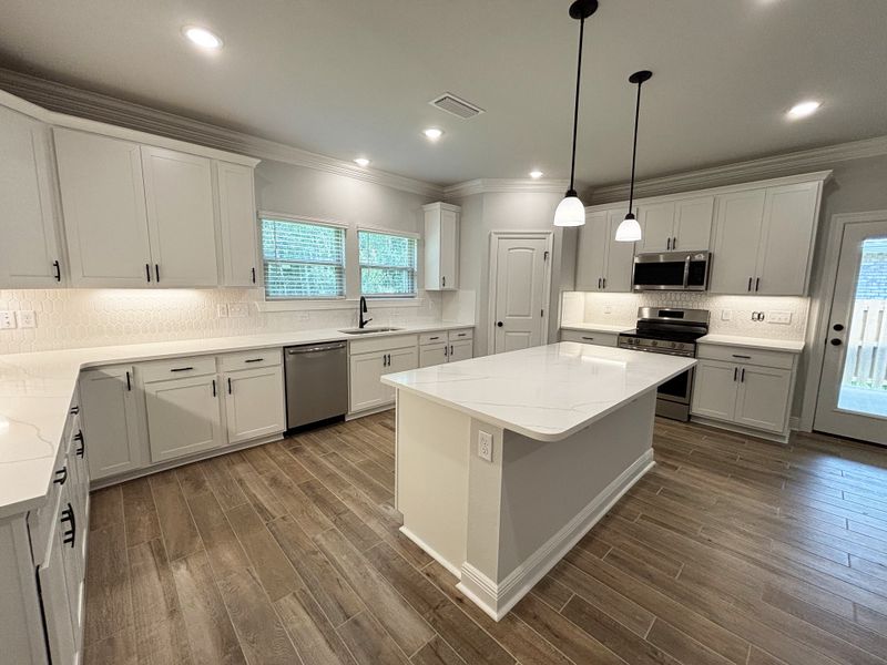 Furnished interior view inside a new home in Bird Song at Hammock Bay, Freeport (Image 6).