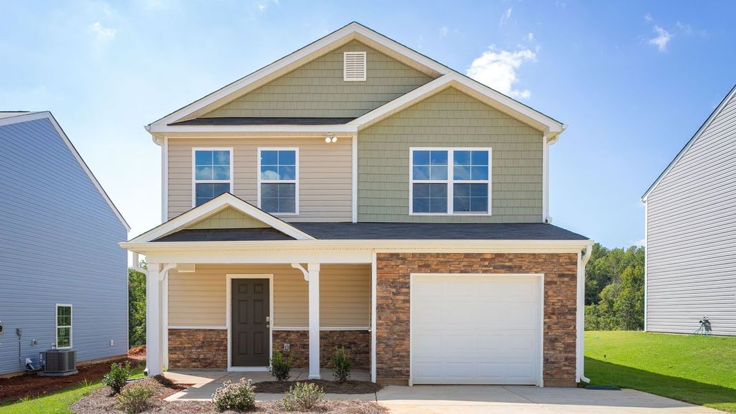 Representative exterior photo of a completed home built from the OLIVER by D.R. Horton in River's Edge, Mayodan, NC (Image 17).